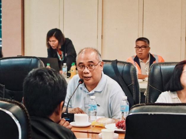 Reverend Father Al Bonono of the Diocese of Surigao discusses the accurate representation of TSF 6 in the development map of the Siana Gold Project.