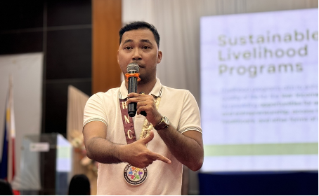 Instructor Jeremiah B. Napone of Caraga State University presents the importance of developing and sustaining livelihood projects in the local economy Caraga communities.