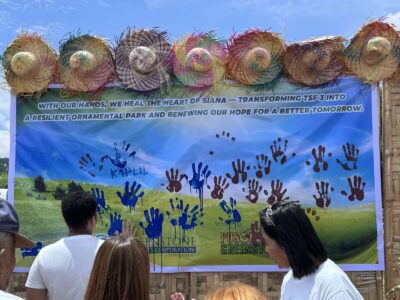 In Photo: Siana Resident putting its handprint to the resilient board giving hope and promise for a better and resilient tomorrow.