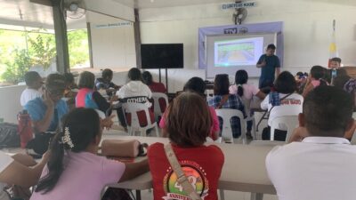 Trainer Jayson P. Villegas demonstrates proper vegetable planting techniques during the two-day training conducted by TVIRD and its SIDLAK Techno Demo Farm, with support from LGU-Bayog, the Department of Agriculture, and PESO.