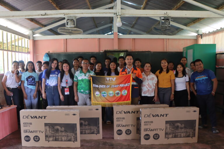 Teachers and students at Supon National High School show their appreciation as TVIRD turns over Smart TVs intended to enhance their education.