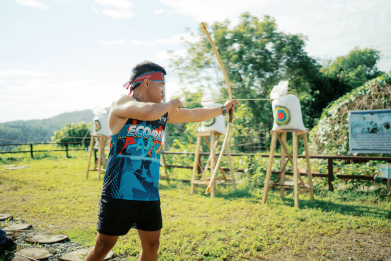 A TVIRD employee joins the archery competition at the company’s Balabag Gold and Silver Project site.
