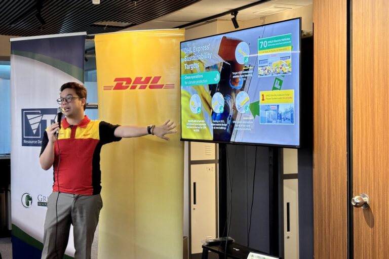 DHL Philippines Field Sales Executive John Paul Perez presents the rationale behind the DHL GoGreen Plus Program and its sustainability targets prior to conferring the certificates.