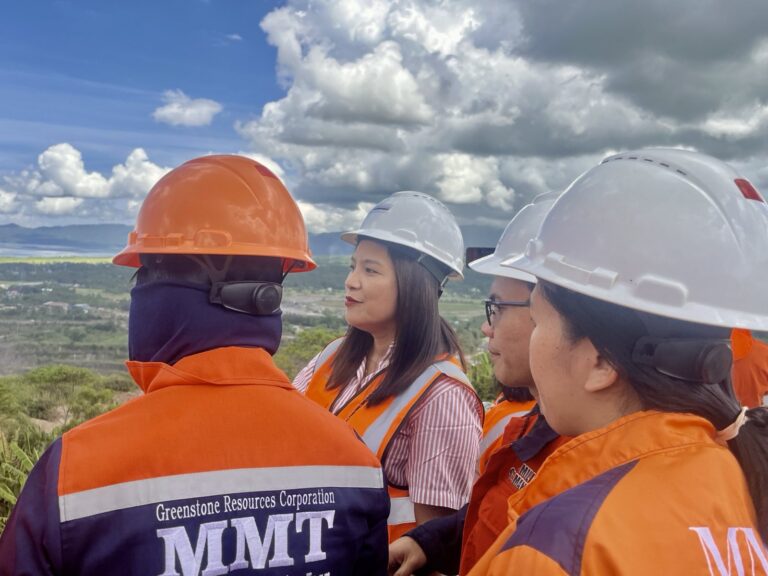 TVIRD Director for Tenement and Environmental Management Jesalyn Guingguing shows the Siana main pit from the company’s newly installed view deck.