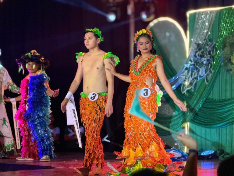 Kenneth and Mechei fashionably parade their creative wear during the pageant.