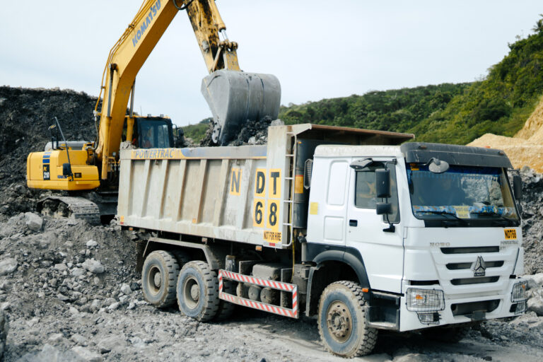 Intricate loading. Grace loads ore into a Dump Truck with a high sense of precision – just the exact tonnage needed for efficient haulage.