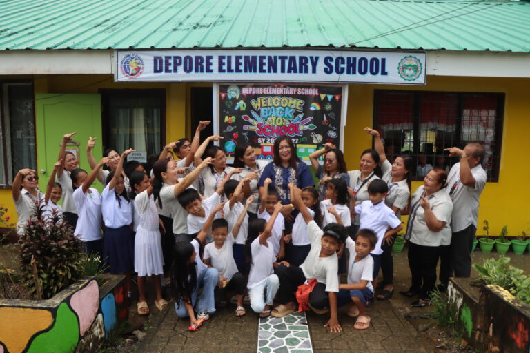 A well-loved principal. Students and teachers of Depore Elementary School share a moment with Principal Mercy, showing their love and support to their school head as she embarks on her new endeavor.