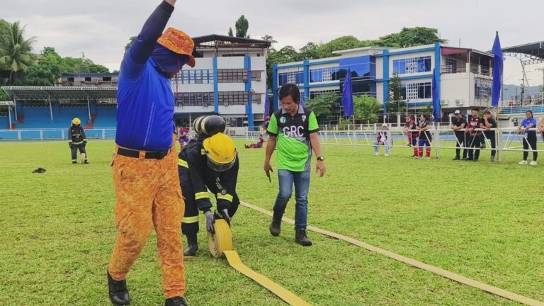 Greenstone ERT Coordinator Aldrin Dolaoco provides coaching and guidance to a member during the Hose Management Relay, demonstrating the team's precision, teamwork, and operational excellence.
