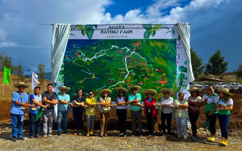 Honored guests participated in an arm-in-arm pose in support of the groundbreaking ceremony of Agata Mines Nature Farm.